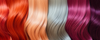 Flowing hair swatches arranged side by side in copper, peach, silver-gray, and magenta.