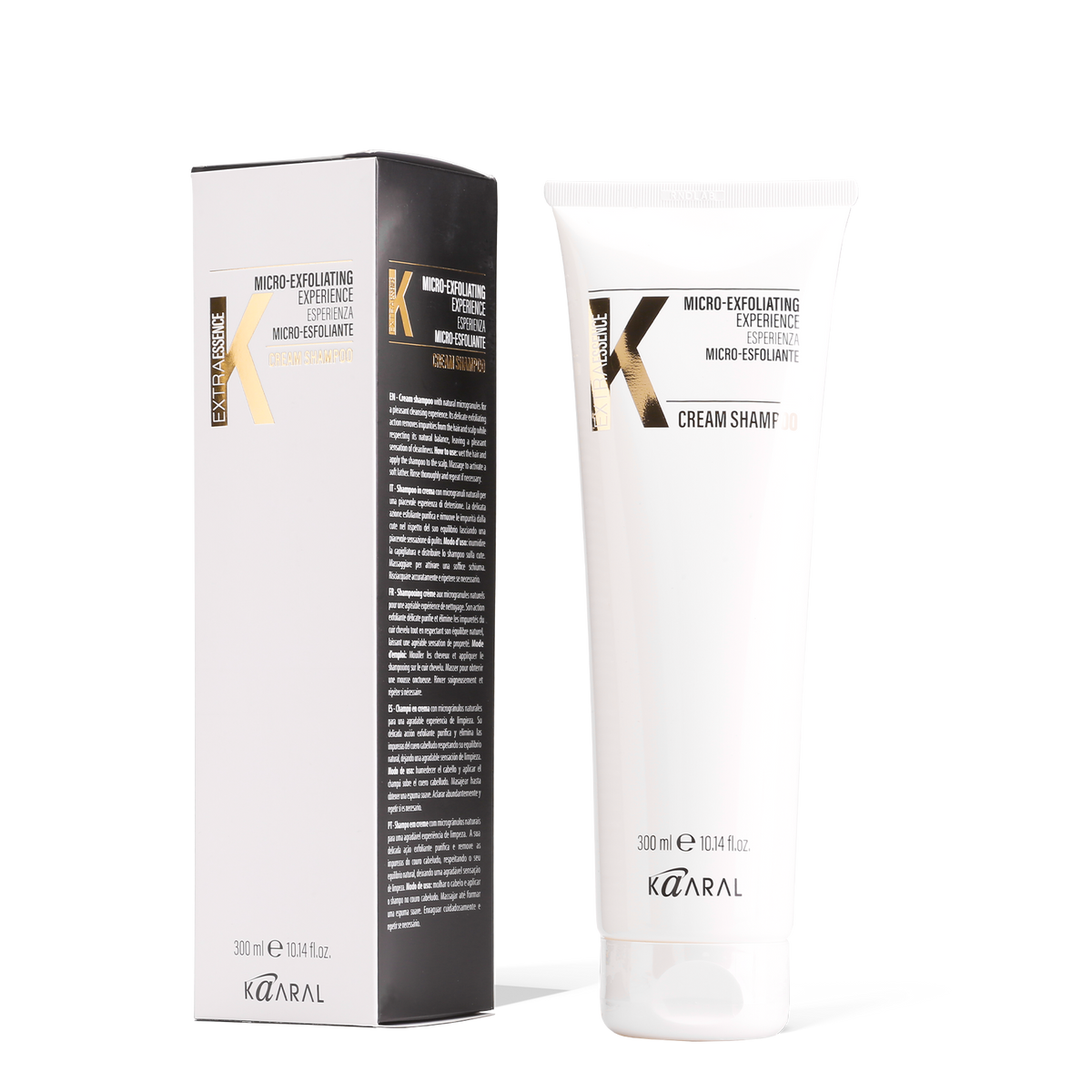 Black and white K Extra haircare tubes on a black background
