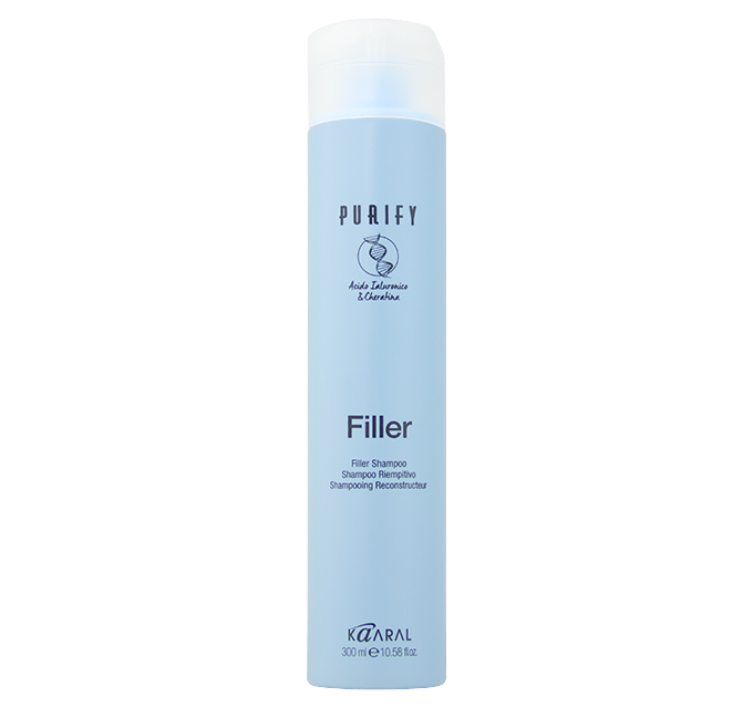 Purify Filler Shampoo 300 ml reconstructing shampoo in a light blue cylindrical bottle with a white cap, isolated on a transparent background.