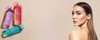 K05 scalp treatment products displayed with colorful gel textures beside a woman with long, sleek hair on a soft beige background with open space in the center for banner content.