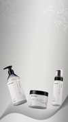 Three silver Maraes hair products on a light gray botanical background