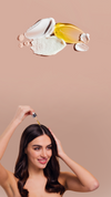 Woman applying hair serum with a dropper to her scalp beneath oil and cream textures on a soft beige background with open space in the center for banner content.