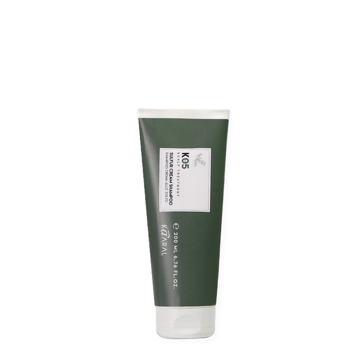 Green haircare squeeze tube on a black background