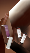 Assorted product tubes arranged on brown geometric pedestals