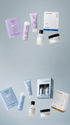 Kaaral hair care travel kits and products arranged on a pale blue background