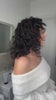 Woman washing, combing, and styling her short dark curls with Maraes Curly Care products, then showing the finished look.